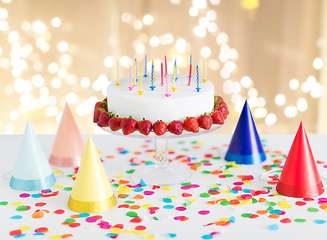 Image showing birthday cake with candles and strawberries