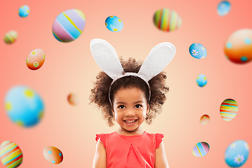 Image showing happy little girl wearing easter bunny ears