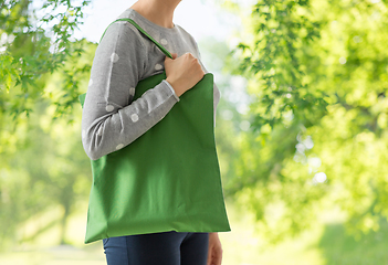 Image showing woman with reusable canvas bag for food shopping