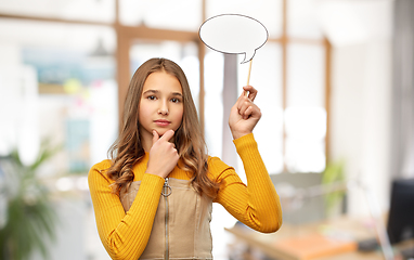 Image showing teenage girl holding speech bubble over office