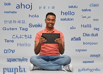 Image showing happy indian man with tablet pc