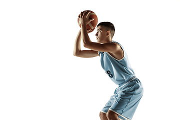 Image showing Full length portrait of a young basketball player with ball