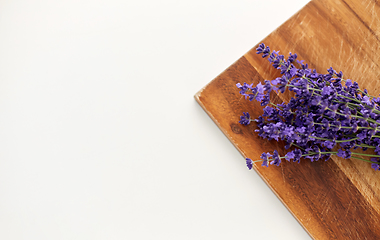 Image showing bunch of lavender flowers on wooden board