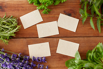 Image showing greens, spices or medicinal herbs on wood