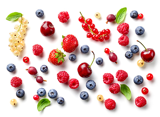 Image showing composition of fresh berries and green leaves