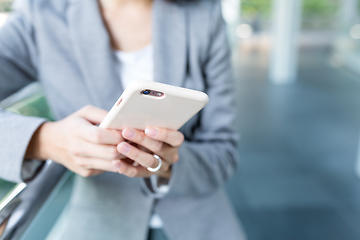 Image showing Businesswoman use of mobile phone at outdoor