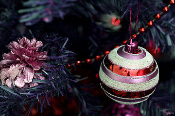 Image showing Christmas ornaments on tree.