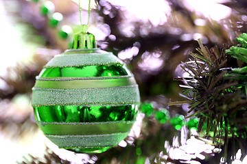 Image showing Christmas ornaments on tree.