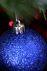 Image showing Christmas ornaments on tree.