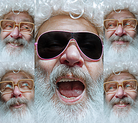 Image showing Emotional Santa Claus in eyewear greeting with New Year and Christmas