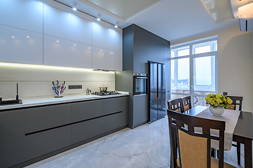 Image showing Luxury white and dark grey modern kitchen interior