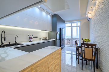 Image showing Luxury white and dark grey modern kitchen interior