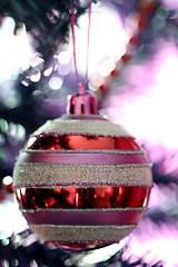 Image showing Christmas ornaments on tree.