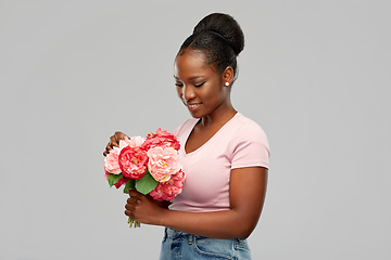 Image showing happy african american woman with bunch of flowers