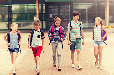 Image showing group of happy elementary school students walking