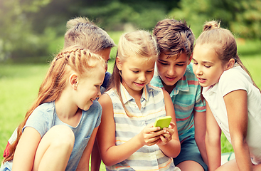 Image showing kids or friends with smartphone in summer park