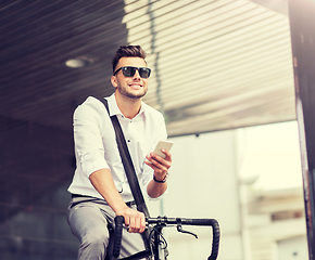 Image showing man with bicycle and smartphone on city street