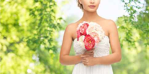 Image showing young woman or bride with bouquet of flowers