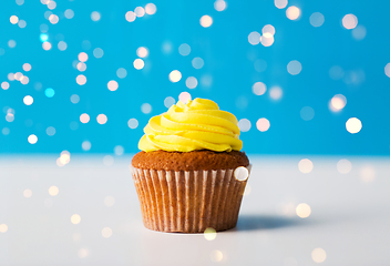 Image showing close up of cupcake or muffin with yellow frosting