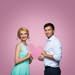 Image showing Beautiful couple holding pink heart