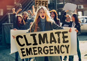 Image showing Young people protesting of climate emergency on the street