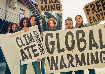 Image showing Young people protesting of climate emergency on the street