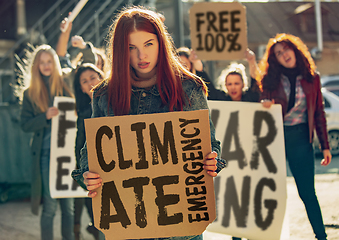 Image showing Young people protesting of climate emergency on the street