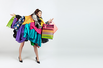Image showing Woman addicted of sales and clothes, overproduction and crazy demand