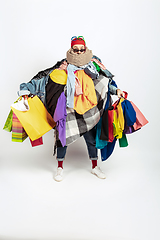 Image showing Man addicted of sales and clothes, overproduction and crazy demand