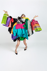 Image showing Woman addicted of sales and clothes, overproduction and crazy demand