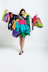 Image showing Woman addicted of sales and clothes, overproduction and crazy demand