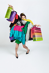 Image showing Woman addicted of sales and clothes, overproduction and crazy demand