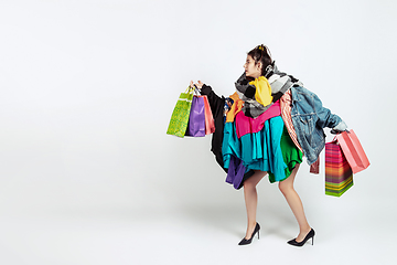 Image showing Woman addicted of sales and clothes, overproduction and crazy demand