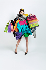 Image showing Woman addicted of sales and clothes, overproduction and crazy demand