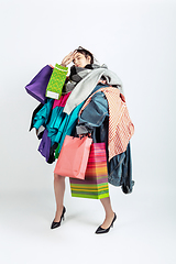 Image showing Woman addicted of sales and clothes, overproduction and crazy demand