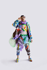 Image showing Man addicted of sales and clothes, wearing plastic, recycling concept