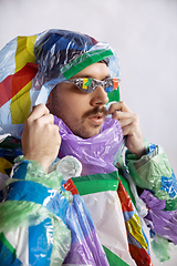 Image showing Man addicted of sales and clothes, wearing plastic, recycling concept