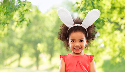 Image showing happy little girl wearing easter bunny ears