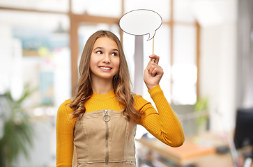 Image showing teenage girl holding speech bubble over office