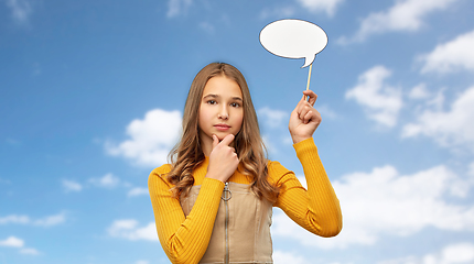 Image showing teenage girl holding speech bubble over sky