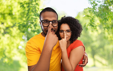 Image showing happy african american couple in glasses hugging