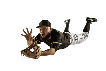 Image showing Baseball player, pitcher in a black uniform practicing on a white background.