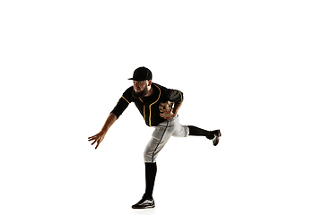 Image showing Baseball player, pitcher in a black uniform practicing on a white background.