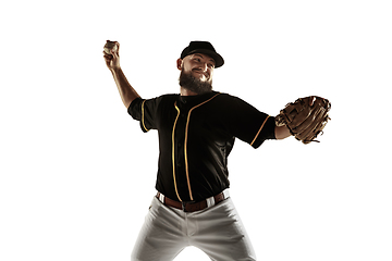 Image showing Baseball player, pitcher in a black uniform practicing on a white background.