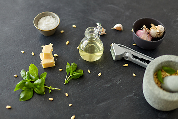 Image showing ingredients for basil pesto sauce on stone table