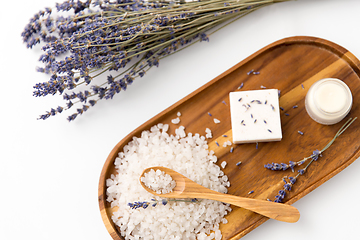 Image showing sea salt, lavender soap and moisturizer on tray