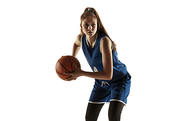 Image showing Young caucasian female basketball player against white studio background