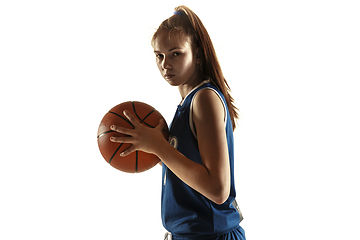 Image showing Young caucasian female basketball player against white studio background