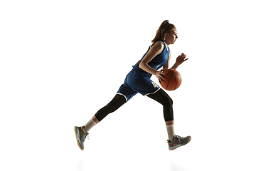 Image showing Young caucasian female basketball player against white studio background