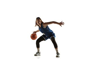 Image showing Young caucasian female basketball player against white studio background